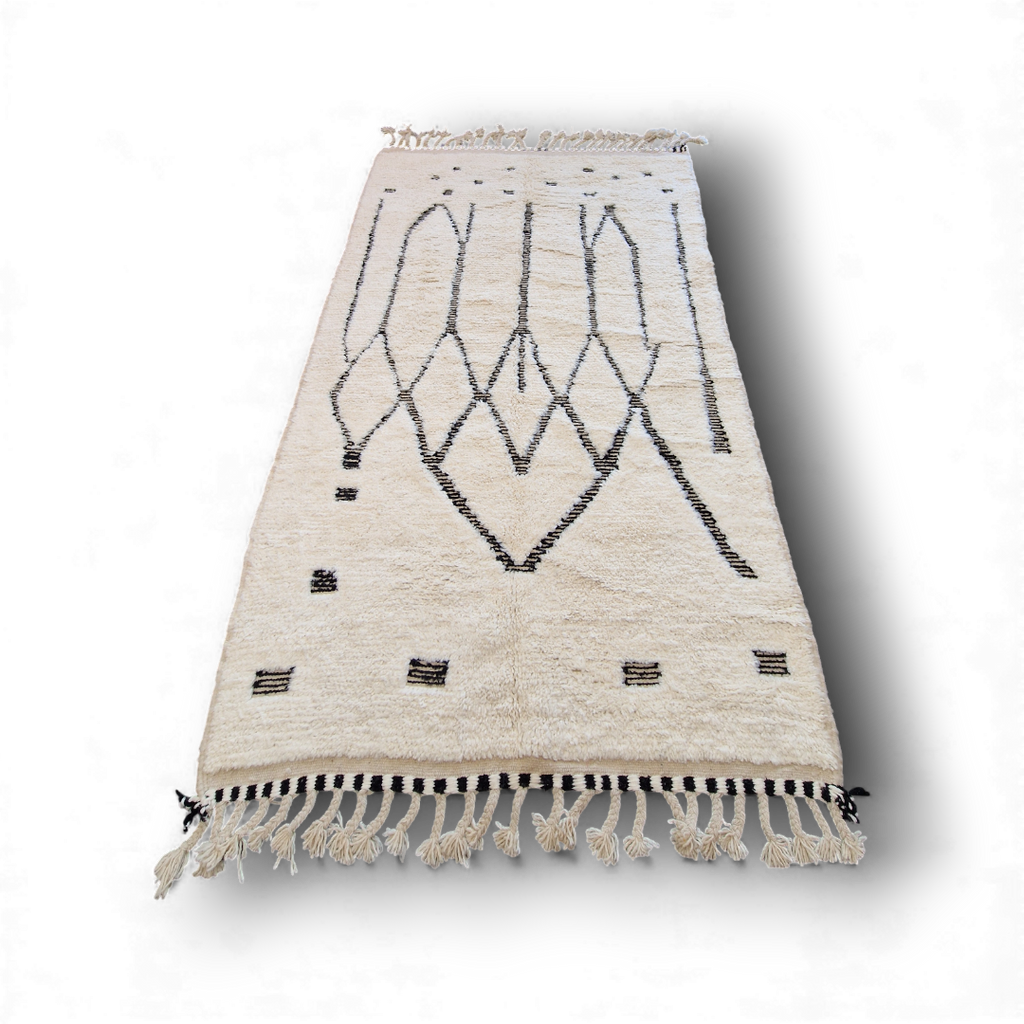 authentique tapis traditionnel marocain, tissé dans l'atlas par des Berbères, fait-mains en pure laine avec des motifs en relief modernes