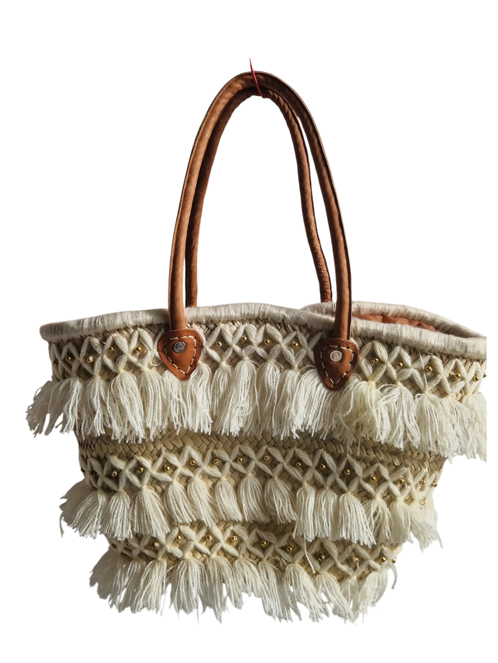 Panier tressé en feuilles de palmier, avec des poignée en cuir, et des franges en fil. Peut être utilisé en sac à main, en panier pour les courses, pour aller à la plage...