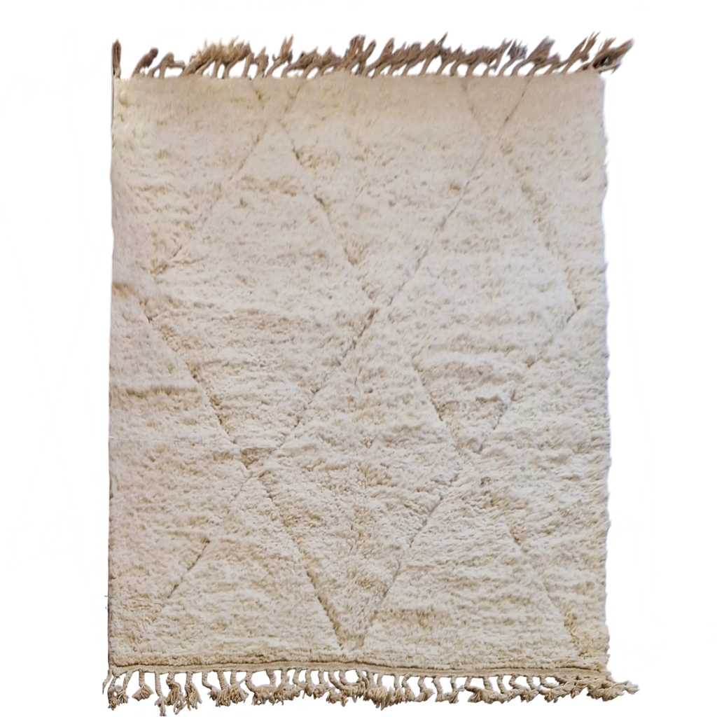 Véritable tapis berbère beni ouarain de l'atlas marocain. Tissé en laine à la main  selon un savoir ancestral.